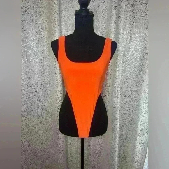 Never worn orange Lycra bodysuit - Picture 2 of 3